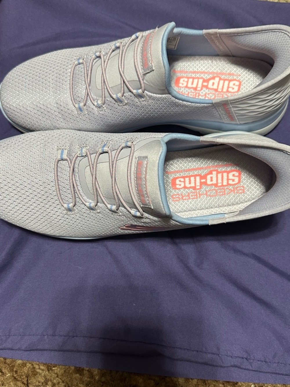 Womens sketcher slip-ins.  Lilac with blue accents.  Excellent condition.